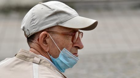 Old Man Wearing His Face Mask Improperly