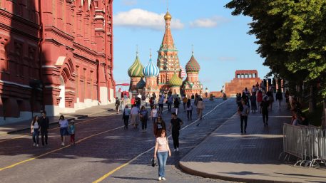 Kremlin passage with a view of St. Basil's Cathedral on Red Square in Moscow, summer day. Russia Moscow June 2020.