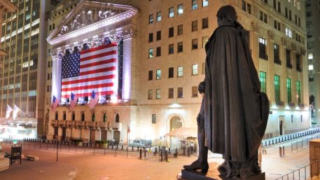 Behind the George Washington Statue looking towards the New York Stock Exchange on Wall Street