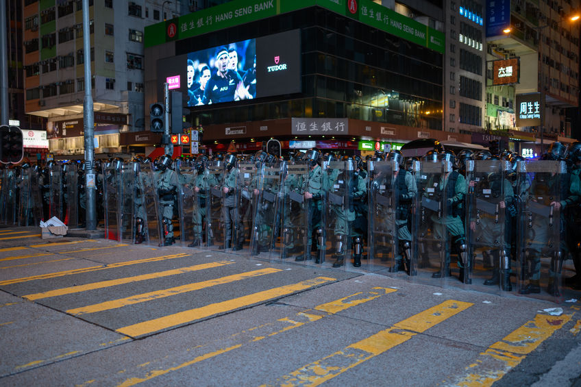 Hong Kong - Aug 3, 2019: Hong Kong August 3 protest which is rejected by police force. Police swearing Street in mong kok.