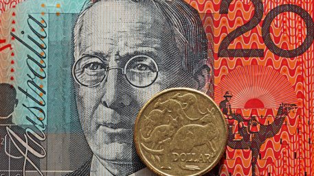 Australian twenty dollar note and one dollar coin