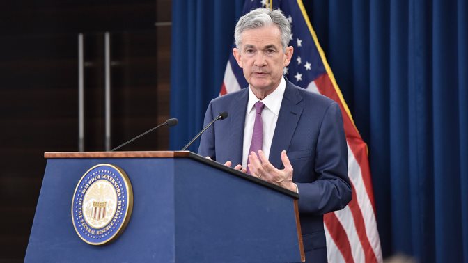 Chairman Powell answers a reporter's question at the press conference