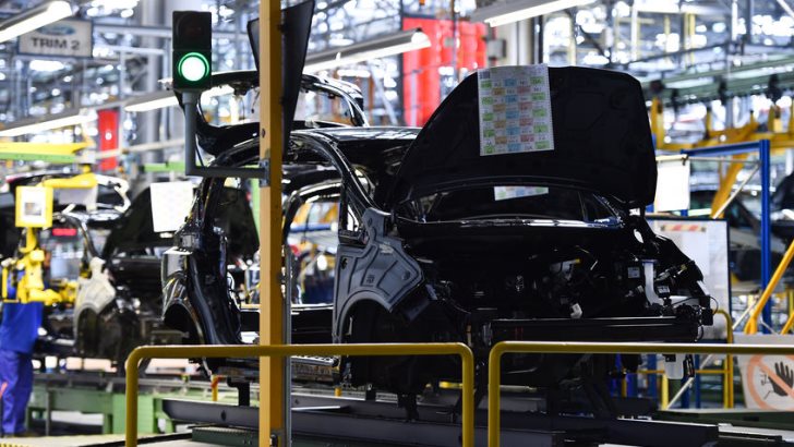 Car bodies on the production line inside German automobile factory