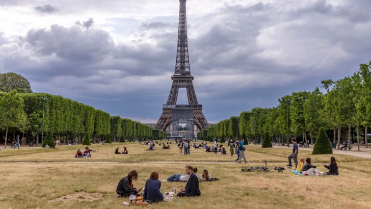 Parisians return to relax on the lawns of the Champs de Mars in front of Eiffel tower after the lockdown due to covid-19