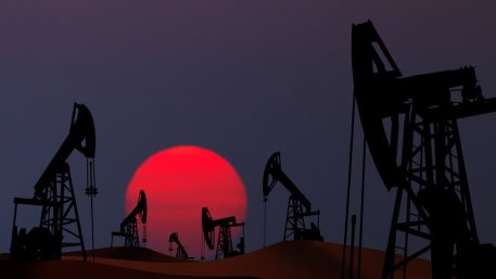 Oil pumps silhouette at sunset