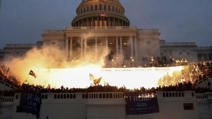 An explosion caused by a police munition at the Capitol Building, January 6. REUTERS