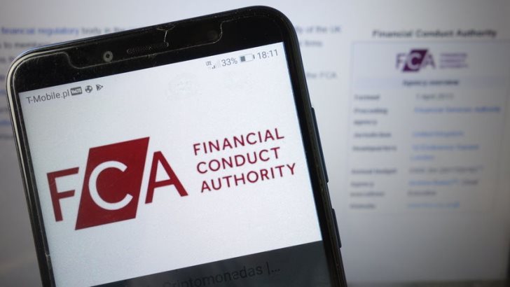 FCA Financial Conduct Authority logo displayed on mobile phone