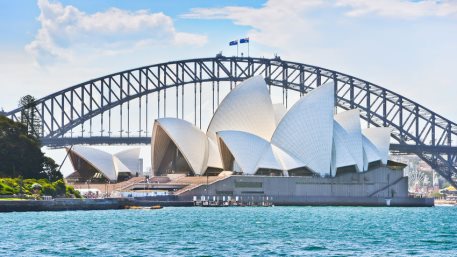 Sydney Harbor Bridge and Opera House on a sunny day. AUDUSD Jumped as RBA Eyes Transition of the Economy to "Expansion Phase"