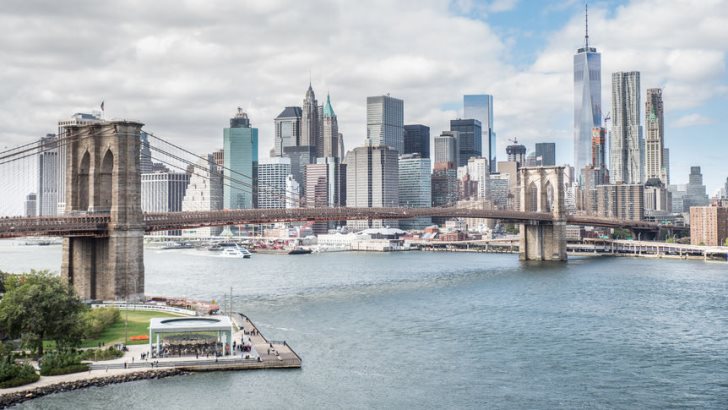 View of Brooklyn Bridge and Manhattan skyline - New York City downtown, photographed from Manhattan Bridge