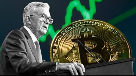 Fed Chair Jerome Powell wiith a BTC coin